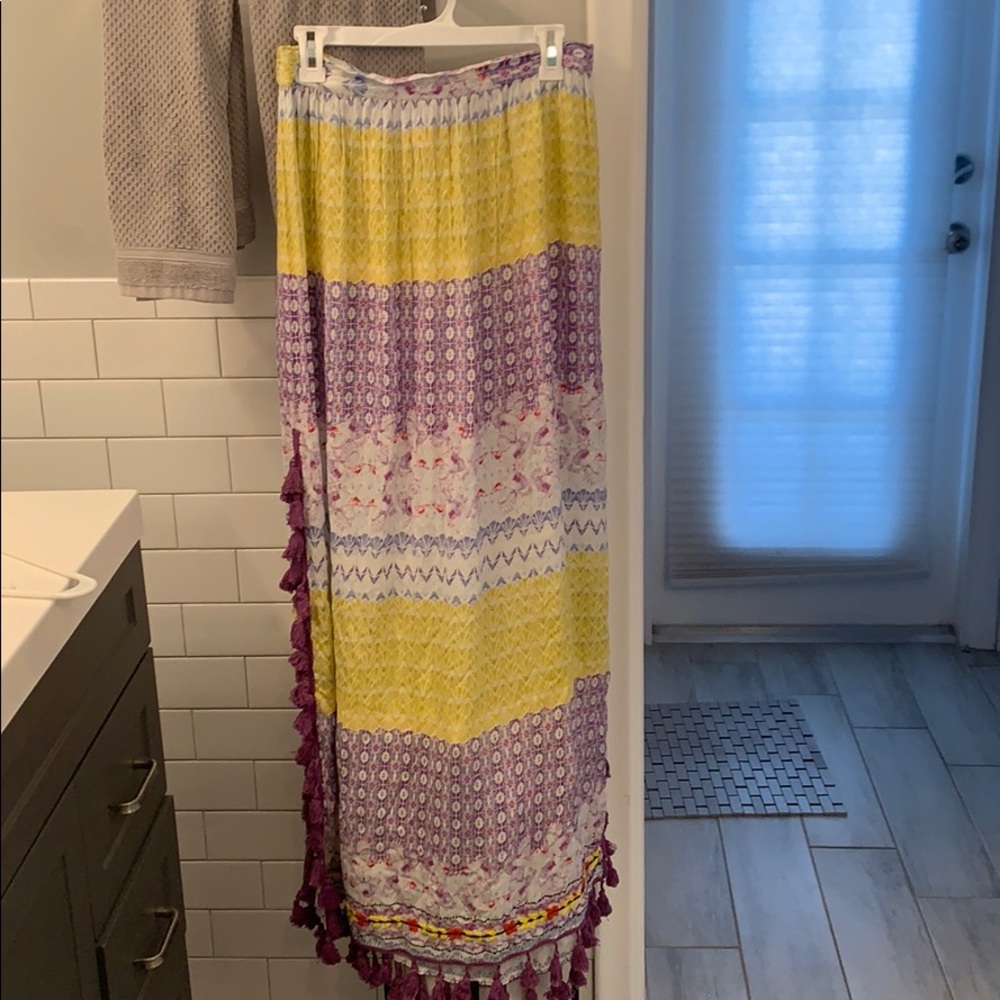Bohemian style long skirt with tassels.